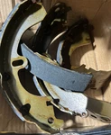 Box Of 4 Drum Brake Rear Auto Extra AXS551 Shoes Distressed Nos. Fixed Price $20.00.